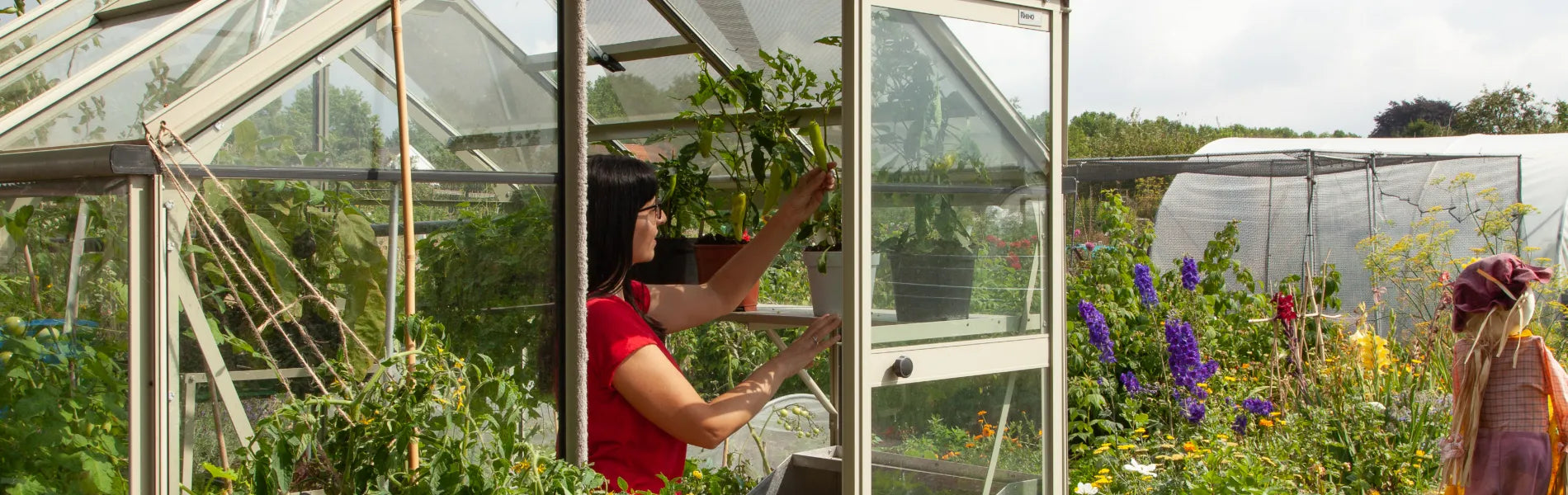 Ellen in her Rhino Greenhouse