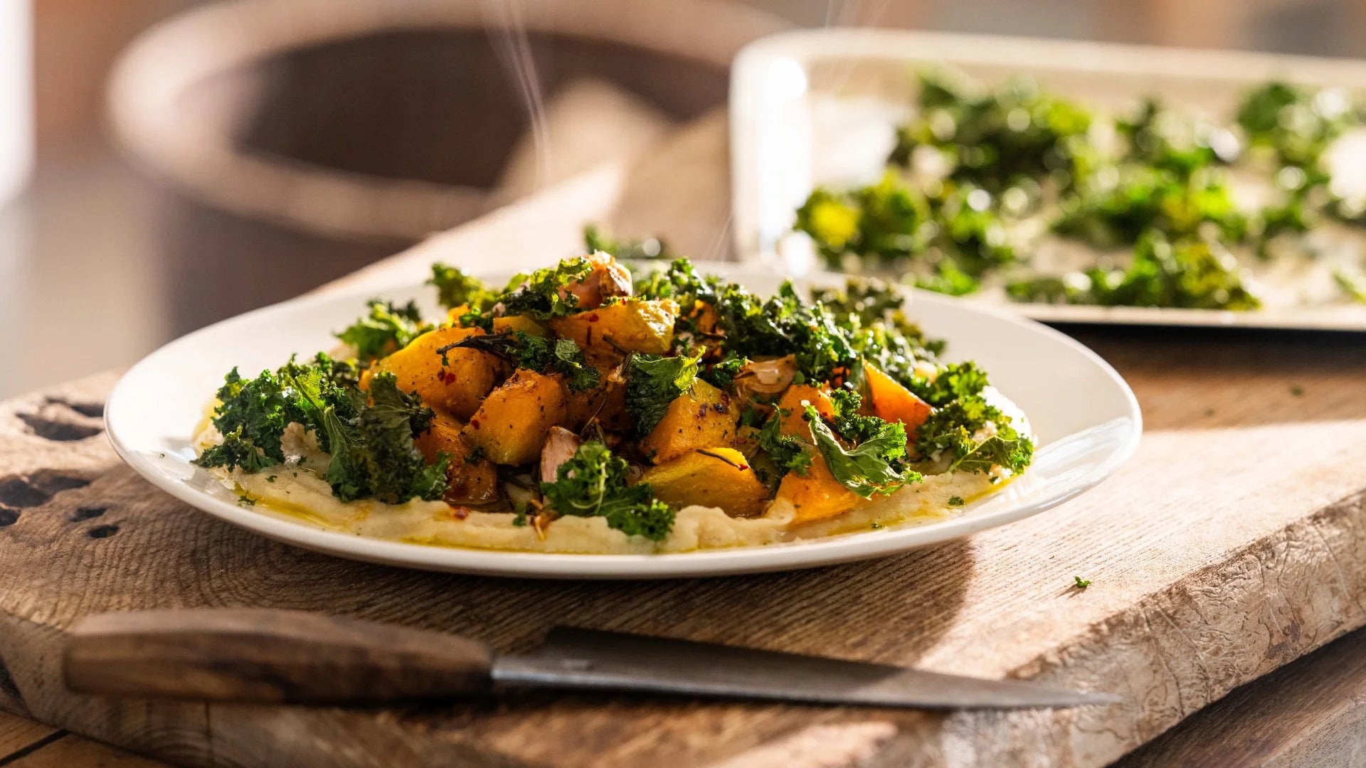 Roast Autumn squash with parsnip puree and crispy kale