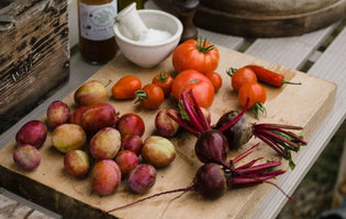 a selection of greenhouse produce on a chopping board