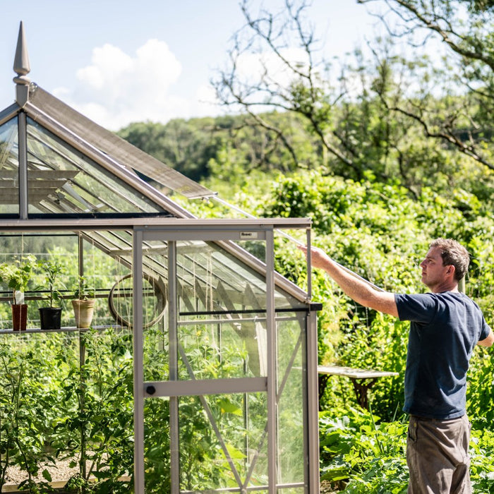 Man pulling down 6ft-7ft-8ft roof blind